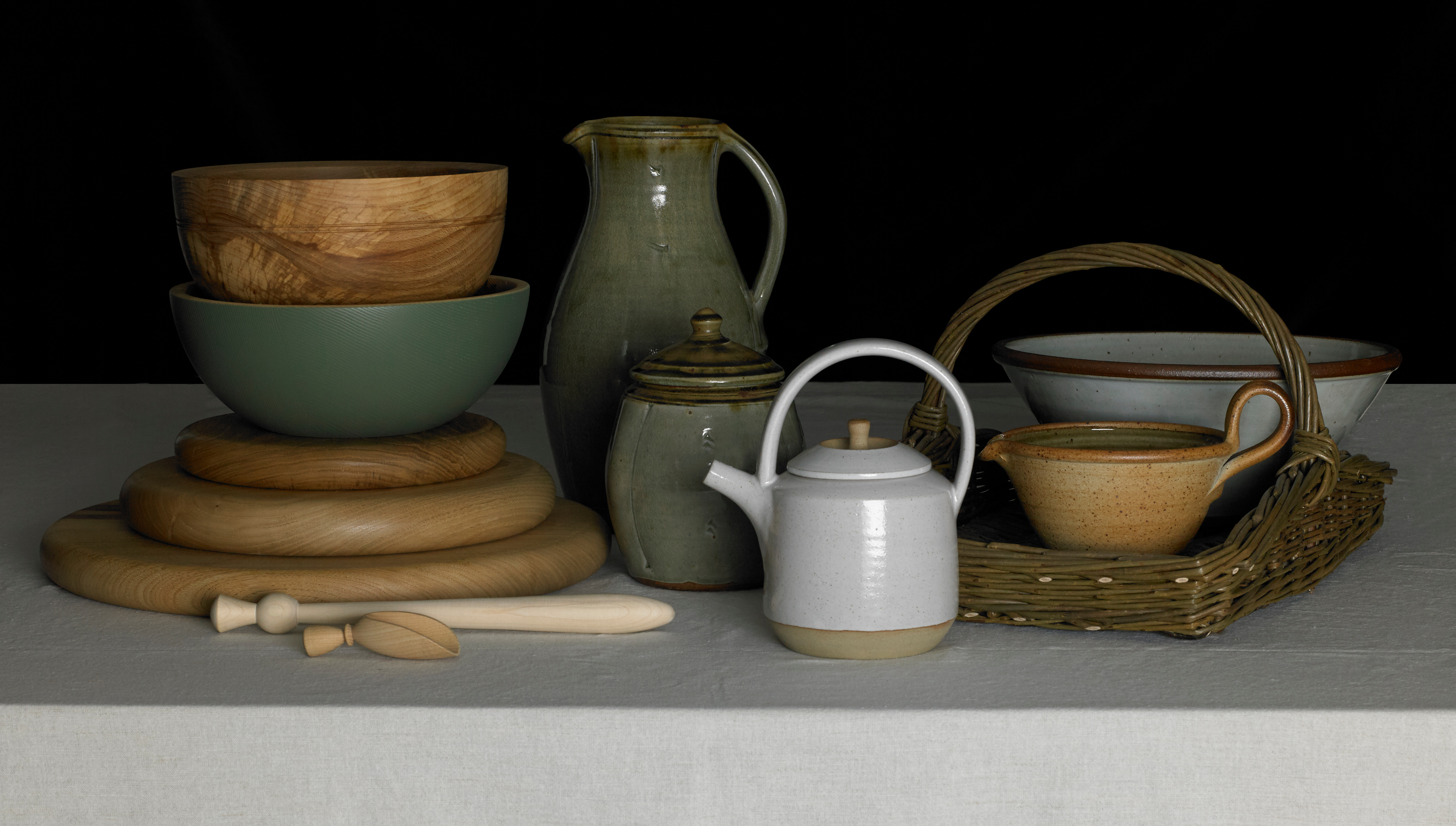 Several purses arranged on a light background.